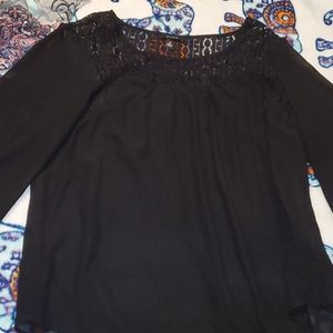 Completely black sheer blouse